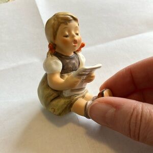 Charming Ceramic Figurine with Brown and Cream Accents